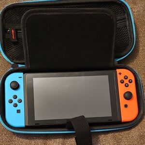 Nintendo Switch with Neon Blue and Red J